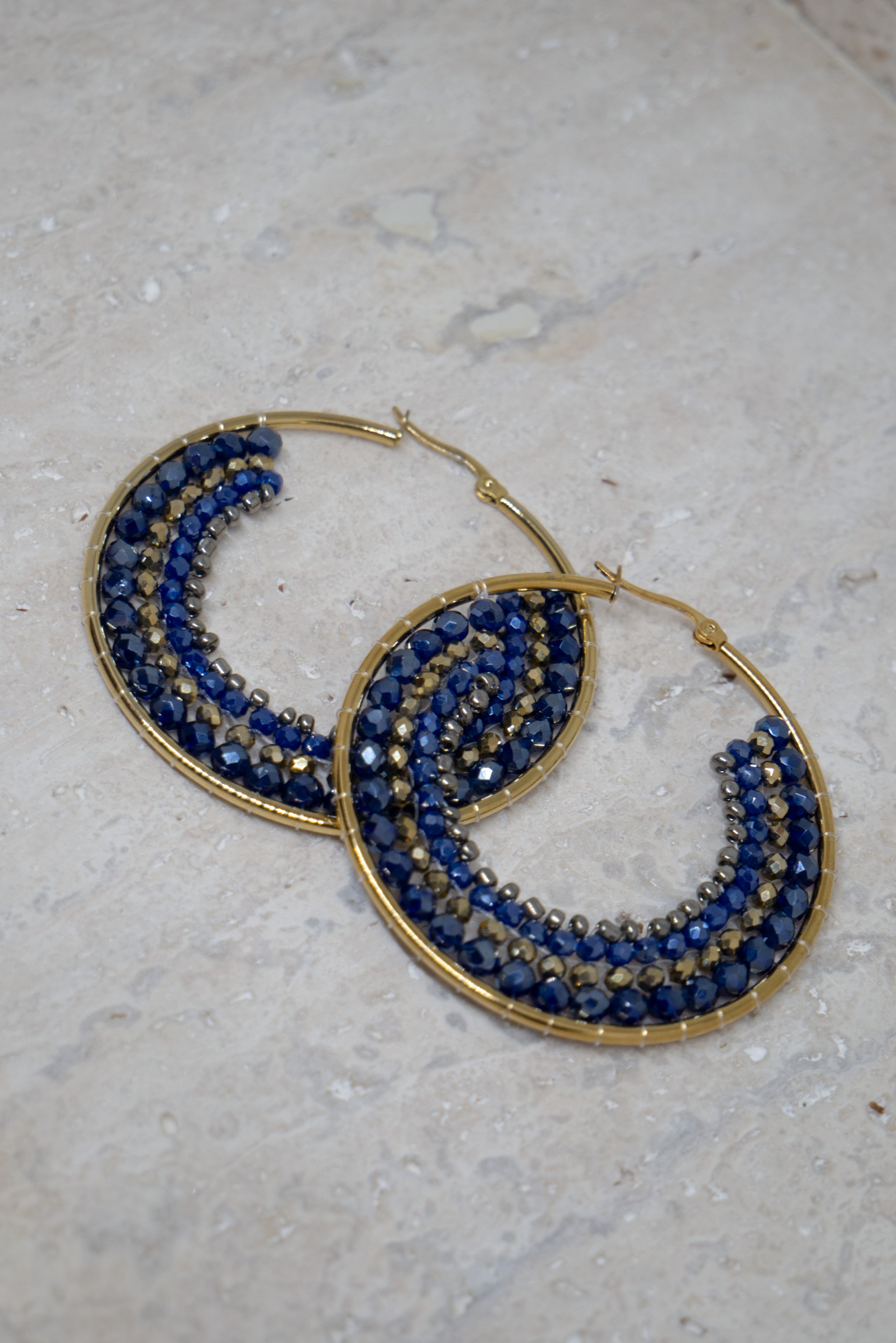 Blauwe ronde statement oorbellen